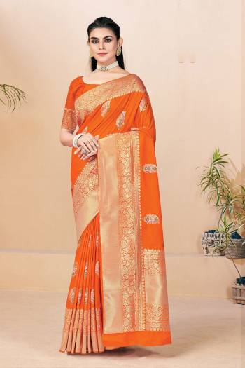 Attrective This Traditional Saree Paired With Blouse.This Saree And Blouse Are Banarasi Silk Based Fabric With Wevon Designer Jari Work. Buy This Pretty Saree Now.