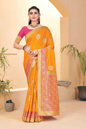 Attrective This Traditional Saree Paired With Blouse.This Saree And Blouse Are Banarasi Silk Based Fabric With Wevon Designer Jari Work. Buy This Pretty Saree Now.