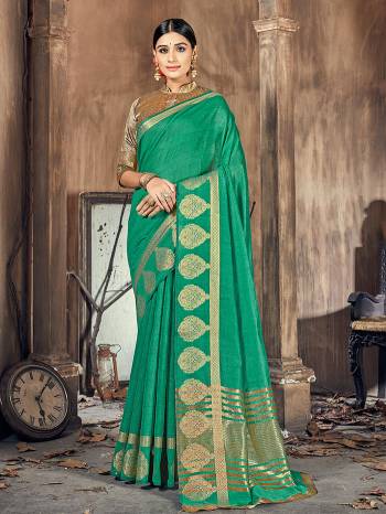 This Pretty Angelic Look Wearing This Wevon Designer Saree In Fine Color Paired With Blouse. This Saree And Blouse Is Cotton Silk Fabricated. Its Pretty Color Pallete Will Give An Attractive Look To Your Personality. 