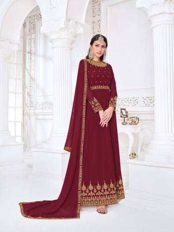 Attrective This Designer Long Length Suit In Lovely Dark Color.Its Pretty Heavy Designer Embroidery Work Top Is Myanmar Georgette Based Paired With Santoon Bottom And Swiss Georgette Fabricated Dupatta Which Gives An Attractive To The Suit.Buy Now.