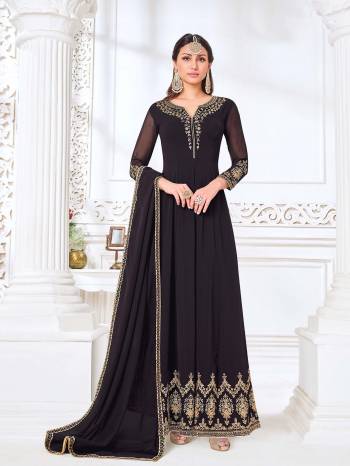 Attrective This Designer Long Length Suit In Lovely Dark Color.Its Pretty Heavy Designer Embroidery Work Top Is Myanmar Georgette Based Paired With Santoon Bottom And Swiss Georgette Fabricated Dupatta Which Gives An Attractive To The Suit.Buy Now.