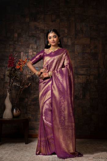 Attrective Looking This Traditional Saree Are Fine Saree Paired With Blouse.This Saree And Blouse Are Raw Silk Based Fabric With Heavy Wevon Designer Work. Buy This Pretty Saree Now.