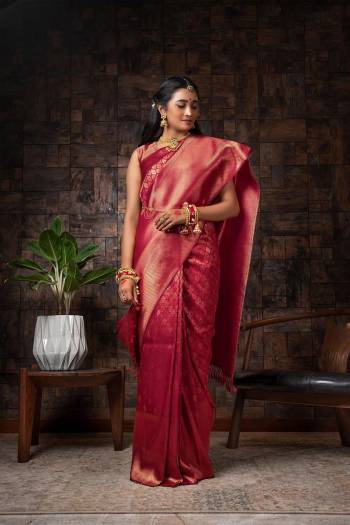 Attrective Looking This Traditional Saree Are Fine Saree Paired With Blouse.This Saree And Blouse Are Raw Silk Based Fabric With Heavy Wevon Designer Work. Buy This Pretty Saree Now.