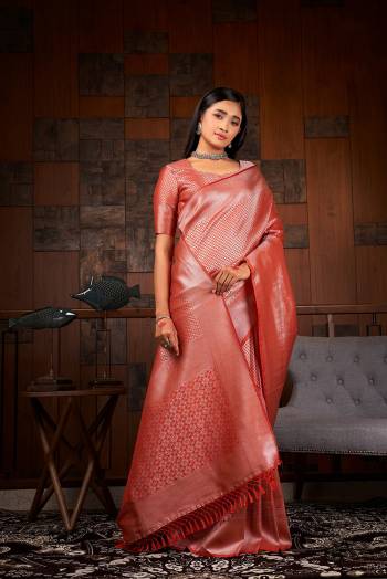 Garb This Traditional Saree Are Fine Saree Paired With Blouse.This Saree And Blouse Are Raw Silk Based Fabric With Heavy Weaving Designer Work. Buy This Pretty Saree Now.