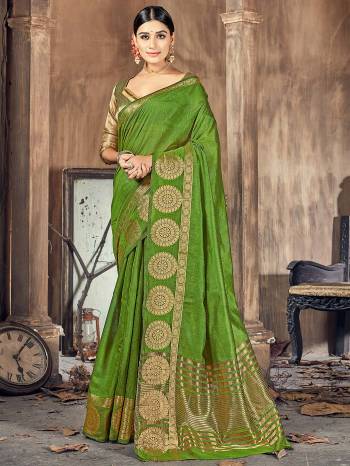 Garb This Pretty Angelic Look Wearing This Wevon Border Pallu Designer Saree In Fine Color Paired With Blouse. This Saree And Blouse Is Cotton Silk Fabricated. Its Pretty Color Pallete Will Give An Attractive Look To Your Personality. 