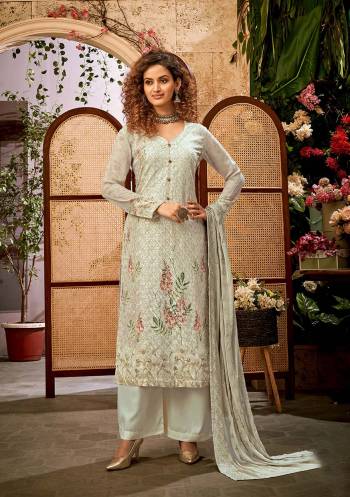 Fine Looking This Designer Long Length Suit In Lovely Color.Its Pretty Designer Embroidery, Printed Work Top Is Viscose Bembeg Georgette Based Paired With Santoon Bottom And Chiffon Fabricated Dupatta Which Gives An Attractive To The Suit.