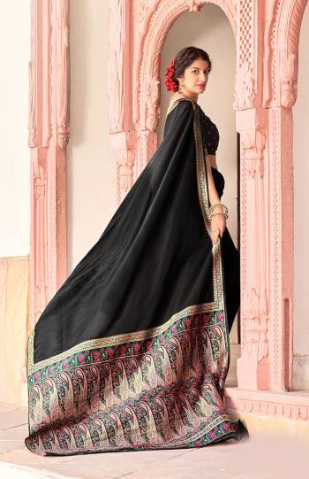 Be your own style diva with this bright colored silk designer traditional saree. This lovely attire is looking extra beautiful with embelishment of weaving work. Comes with contrast unstitched blouse piece..