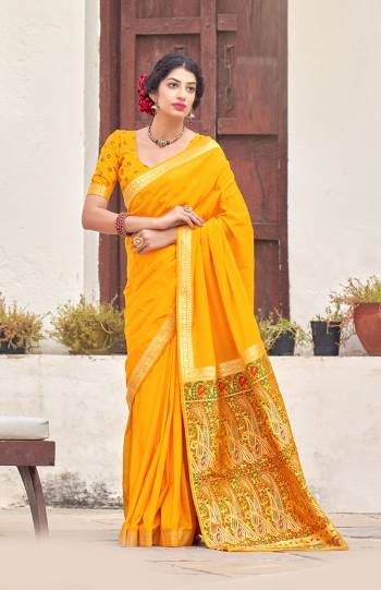 Be your own style diva with this bright colored silk designer traditional saree. This lovely attire is looking extra beautiful with embelishment of weaving work. Comes with contrast unstitched blouse piece..