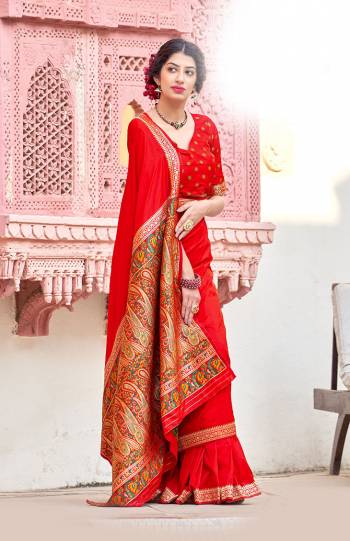 Be your own style diva with this bright colored silk designer traditional saree. This lovely attire is looking extra beautiful with embelishment of weaving work. Comes with contrast unstitched blouse piece..