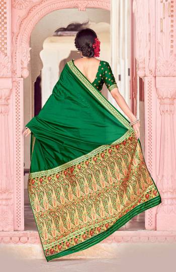 Be your own style diva with this bright colored silk designer traditional saree. This lovely attire is looking extra beautiful with embelishment of weaving work. Comes with contrast unstitched blouse piece..