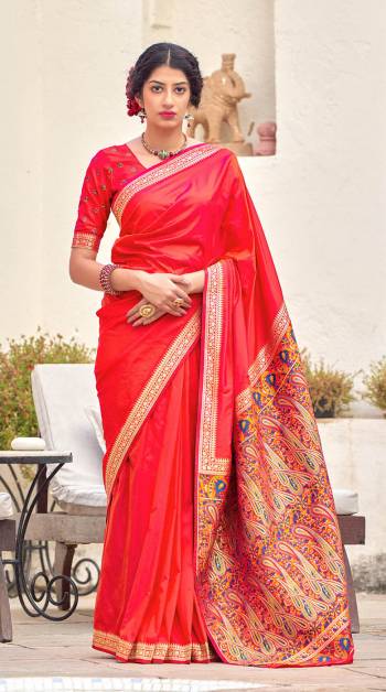 Be your own style diva with this bright colored silk designer traditional saree. This lovely attire is looking extra beautiful with embelishment of weaving work. Comes with contrast unstitched blouse piece..