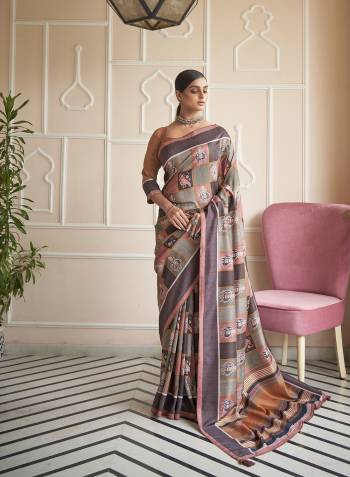 Capture the exuberance of womanhood in its full glory that will bring out your fragility and femininity. Women beauty is magnified tenfold in this alluring creame patola silk contemporary saree. The lovely weaving work throughout the attire is awe inspiring. Comes with Contrast blouse piece