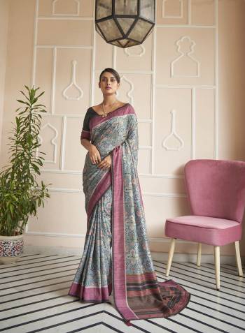 Capture the exuberance of womanhood in its full glory that will bring out your fragility and femininity. Women beauty is magnified tenfold in this alluring creame patola silk contemporary saree. The lovely weaving work throughout the attire is awe inspiring. Comes with Contrast blouse piece