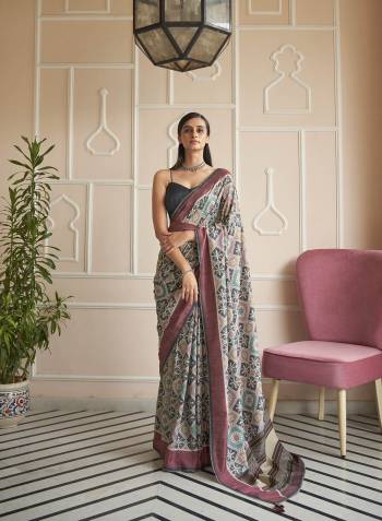 Capture the exuberance of womanhood in its full glory that will bring out your fragility and femininity. Women beauty is magnified tenfold in this alluring creame patola silk contemporary saree. The lovely weaving work throughout the attire is awe inspiring. Comes with Contrast blouse piece