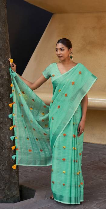 Celebrate your special day in this Lovely Colored Saree.This Saree Fabricated On Linen Comes With Linen Blouse.Buy These Prrtty Saree Now