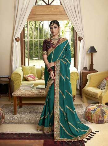 Bright And Visually Appealing Color Is Here With This Designer Saree In Lovely Color Paired With Lovely Colored Blouse. This Saree And Blouse Are Fabricated On Soft CrepeSilk Beautified With Heavy Border Work.Buy Now These Pretty Saree