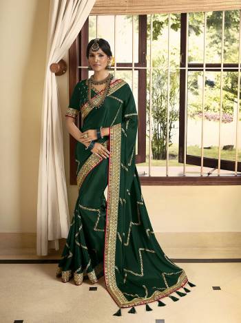 Bright And Visually Appealing Color Is Here With This Designer Saree In Lovely Color Paired With Lovely Colored Blouse. This Saree And Blouse Are Fabricated On Soft CrepeSilk Beautified With Heavy Border Work.Buy Now These Pretty Saree