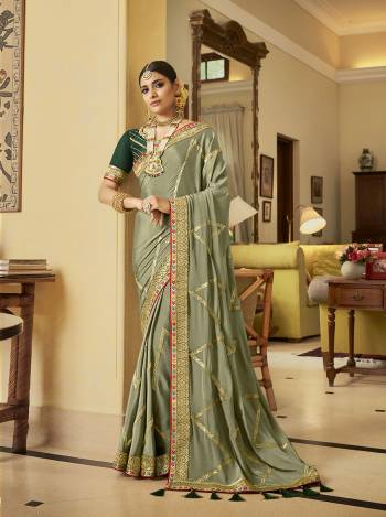 Bright And Visually Appealing Color Is Here With This Designer Saree In Lovely Color Paired With Lovely Colored Blouse. This Saree And Blouse Are Fabricated On Soft CrepeSilk Beautified With Heavy Border Work.Buy Now These Pretty Saree