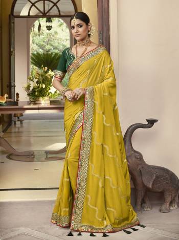 Bright And Visually Appealing Color Is Here With This Designer Saree In Lovely Color Paired With Lovely Colored Blouse. This Saree And Blouse Are Fabricated On Soft CrepeSilk Beautified With Heavy Border Work.Buy Now These Pretty Saree