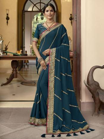 Bright And Visually Appealing Color Is Here With This Designer Saree In Lovely Color Paired With Lovely Colored Blouse. This Saree And Blouse Are Fabricated On Soft CrepeSilk Beautified With Heavy Border Work.Buy Now These Pretty Saree