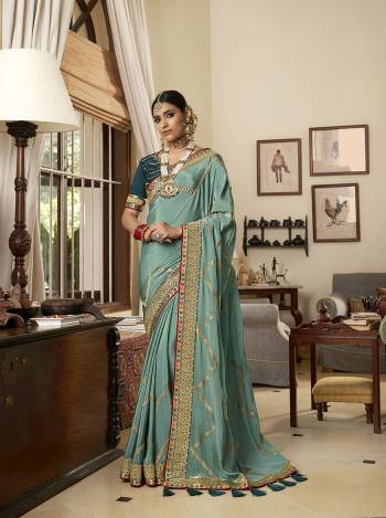 Bright And Visually Appealing Color Is Here With This Designer Saree In Lovely Color Paired With Lovely Colored Blouse. This Saree And Blouse Are Fabricated On Soft CrepeSilk Beautified With Heavy Border Work.Buy Now These Pretty Saree