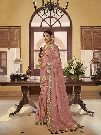 Bright And Visually Appealing Color Is Here With This Designer Saree In Lovely Color Paired With Lovely Colored Blouse. This Saree And Blouse Are Fabricated On Soft CrepeSilk Beautified With Heavy Border Work.Buy Now These Pretty Saree