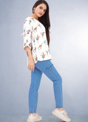 Make the heads turn after you dress up in this Multi color Printed Top. The charming digital print in the course of the dress is awe inspiring.