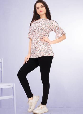 Looking astounding with attachment of Multi color designer Top. The desirable printed a significant characteristic of this dress.