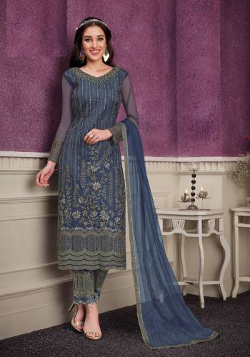 Shine Bright Wearing This Suit In Lovely Color Its Top Is Fabricated On Soft Net Paired With Soft Net Bottom And  Dupatta. Its Top Is Beautified With Designer Embroidery. Buy This Amazing Collection Now