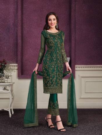 Shine Bright Wearing This Suit In Lovely Color Its Top Is Fabricated On Soft Net Paired With Soft Net Bottom And  Dupatta. Its Top Is Beautified With Designer Embroidery. Buy This Amazing Collection Now