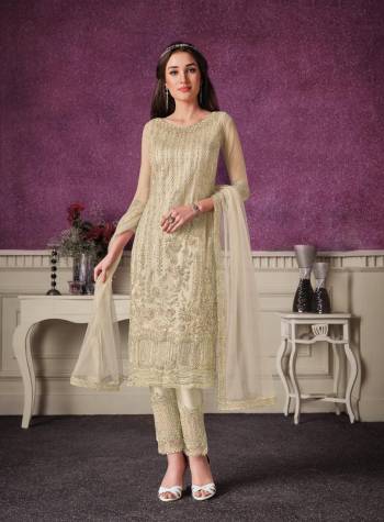 Shine Bright Wearing This Suit In Lovely Color Its Top Is Fabricated On Soft Net Paired With Soft Net Bottom And  Dupatta. Its Top Is Beautified With Designer Embroidery. Buy This Amazing Collection Now