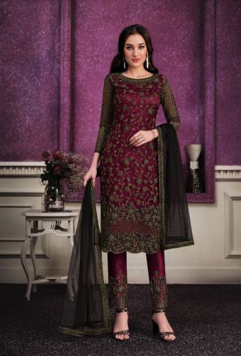 Shine Bright Wearing This Suit In Lovely Color Its Top Is Fabricated On Soft Net Paired With Soft Net Bottom And  Dupatta. Its Top Is Beautified With Designer Embroidery. Buy This Amazing Collection Now