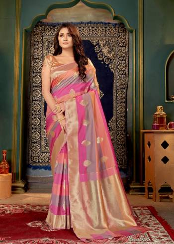 Look Pretty In This Beautifull Saree In Lovely Color Paired With Golden Colored Blouse. This Saree And Blouse Are Fabricated On Banarasi Silk. Buy This Saree Now