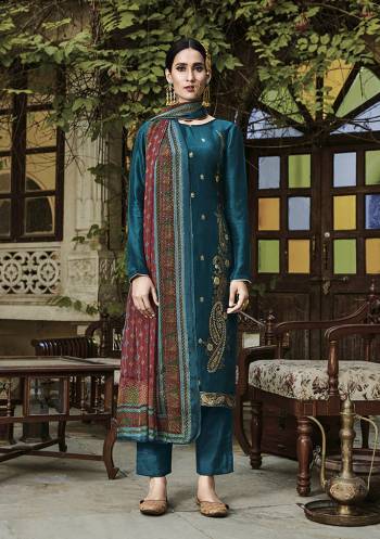 Look Pretty In This Very Beautiful Fancy Straight Suit In Beautifull Color. Its Top Is Viscose RussianSIlk With Viscose Santoon Bottom And Viscose Chinnon Dupatta.It Is Beautified With Very Pretty Embroidery Which Gives A Subtle Look To It.