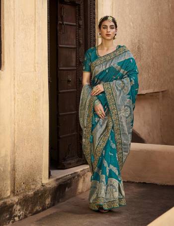 For A Royal And Beautiful Look, Grab This Designer Saree In Pretty Color Paired?With  Designer Blouse. This Saree Is Fabricated On Silk Paired With Raw Silk Fabricated Blouse. Its Pretty Color Pallete And Fabric Will Earn You Lots Of Compliments From onlookers