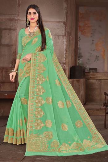 Enhance Your Personality In This Lovely Colored Designer Saree. This Saree?And Blouse Are Fabricated On Cottont Silk Beautified With Zari Work. Buy This Pretty Saree Now.