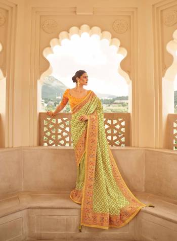 Become the subject of everyone's conversation by Dressing in this eye catching colored festive wear saree. This saree is made of silk fabric which is highlighted with beautiful Zari weaving digital print work as shown. This saree is comfortable to wear and care. Paired with unstitched fabric blouse piece which can be stitched as per your choice and requirement. You can wear this saree for festivals, regular social meets and other homely events. Pair it with traditionally stylish accessories to complete the look.