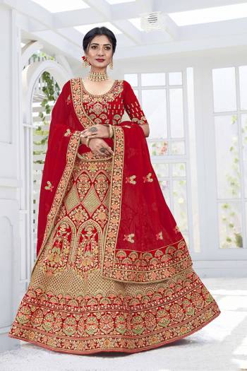 Get Ready For Your D-Day With This Heavy Designer Lehenga Choli In Lovely Color Paired With Pretty Colored Dupatta. Its Blouse And Lehenga Are Fabricated On Velvet Paired With Net Dupattas. Its Lovely Bridal Color Pallete Will Earn You Lots Of Compliments From Onlookers.