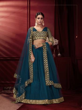 This Wedding Season, Be The Most Attractive Wearing This Heavy Designer Lehenga?Choli In Beautifull Colored Paired With Pretty Blouse And Dupatta. Its Blouse And Lehenga Are Net With Satin Based Paired With Net Fabricated Dupatta.Grab This lovely Collection Now