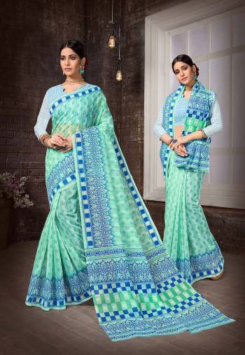 Enhance Your Personality In This Lovely Colored Designer Saree. This Saree?And Blouse Are Fabricated On Cottont Silk Beautified With Designer Printed. Buy This Pretty Saree Now.