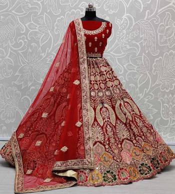 Garb This Bridal Heavy Designer Lehenga Choli In Fine Color Fabricated On Velvet Beautified Fabric Lahenga Choli With Heavy Designer Thread,Dori,Hand Mirror Embroidery,Diamond Work.Buy Now. 