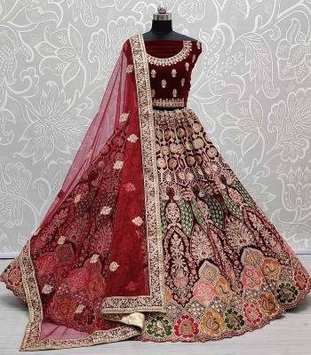 Garb This Bridal Heavy Designer Lehenga Choli In Fine Color Fabricated On Velvet Beautified Fabric Lahenga Choli With Heavy Designer Thread,Dori,Hand Mirror Embroidery,Diamond Work.Buy Now. 