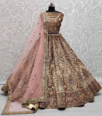 Garb This Bridal Heavy Designer Lehenga Choli In Fine Color Fabricated On Velvet Beautified Fabric Lahenga Choli With Heavy Designer Thread,Jari,Dori,Sequance Embroidery Work.Buy Now. 