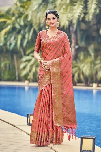 Garb This Tassle Saree Paired With Blouse.This Saree And Blouse Are Organza Based Fabric With Wevon Rich Pallu Designer Work. Buy This Pretty Saree Now.