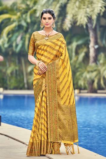 Garb This Tassle Saree Paired With Blouse.This Saree And Blouse Are Organza Based Fabric With Wevon Rich Pallu Designer Work. Buy This Pretty Saree Now.