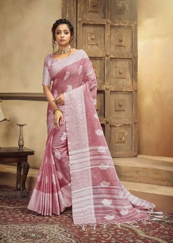 Your Personality In This Lovely Colored Designer Saree. This Saree?And Blouse Are Fabricated On Cottont Linen Beautified With Wevon Designer. Buy This Pretty Saree Now.