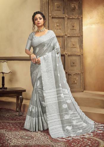 Your Personality In This Lovely Colored Designer Saree. This Saree?And Blouse Are Fabricated On Cottont Linen Beautified With Wevon Designer. Buy This Pretty Saree Now.