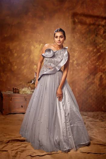 Flaunt Your Rich And Elegant Taste Wearing This Designer Readymade Long Gown In Fine Color. This  Pretty Gown Is Fabricated On Net Beautified With Designer Work. Its Fabric Is Soft Towards Skin And Easy To Carry All Day Long. 