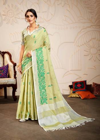 Attrective Looking This Saree Are Fine Saree Paired With Blouse.This Saree And Blouse Are Linen Based Fabric With Wevon Designer Pallu With Embroidery Work. Buy This Pretty Saree Now.