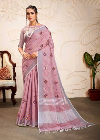 Attrective Looking This Saree Are Fine Saree Paired With Blouse.This Saree And Blouse Are Linen Based Fabric With Wevon Designer Pallu With Embroidery Work. Buy This Pretty Saree Now.